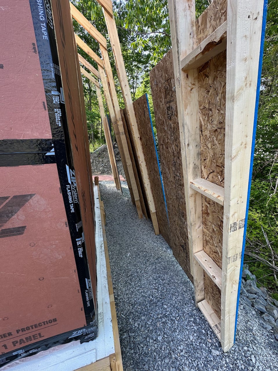 My slide system to get sheathing on the roof: much better!