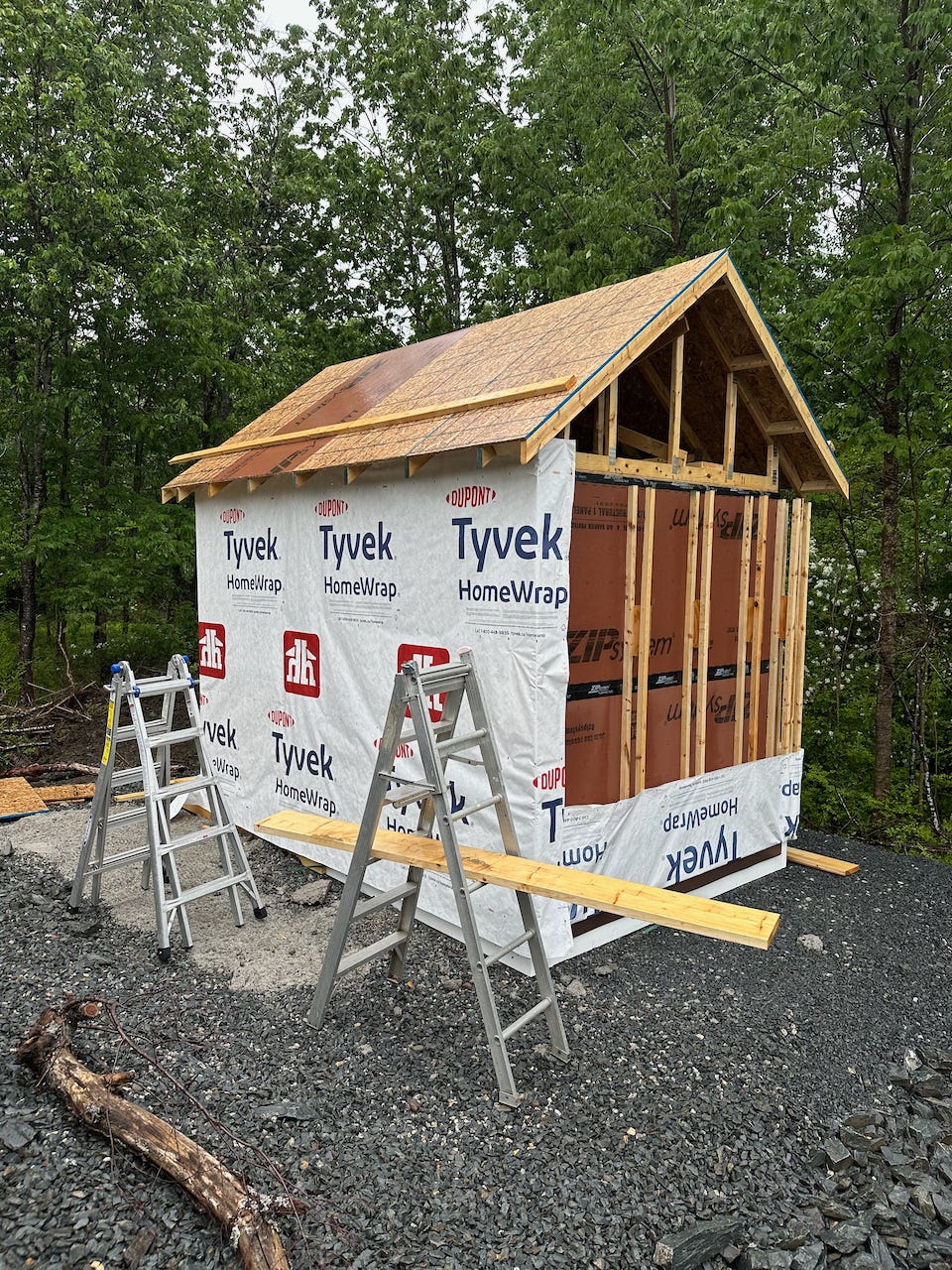 9’ Tyvek housewrap sheet completing the enclosure of the Larsen trusses.